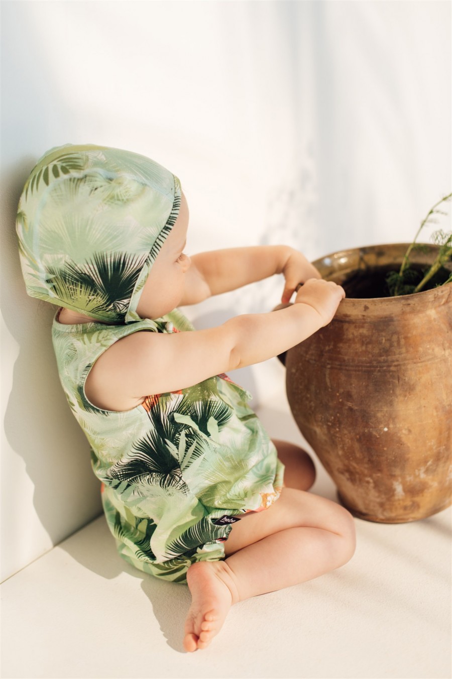 Romper with green palm print SS21037