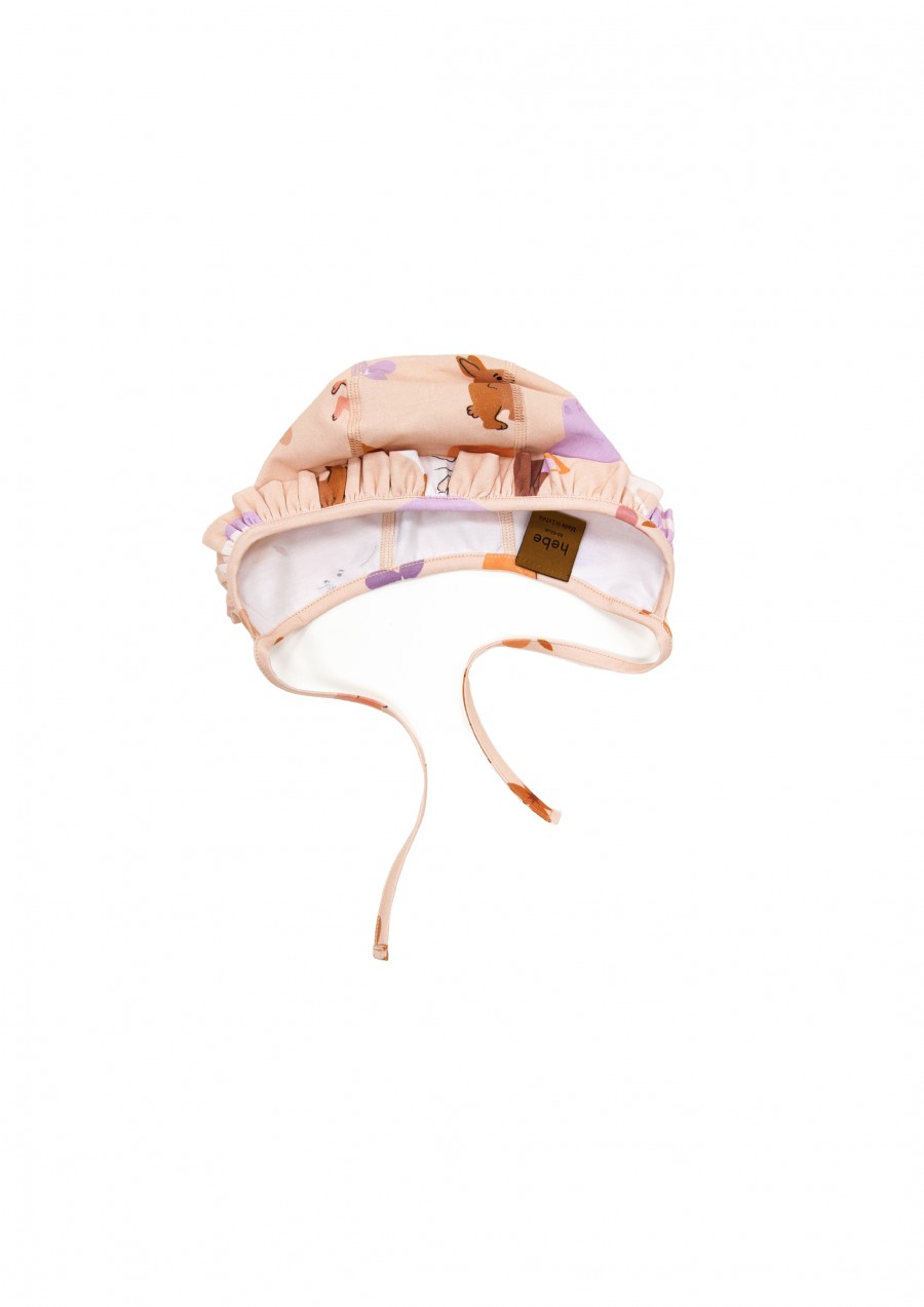 Baby hat with allover unicorn print and ruffle FW24107