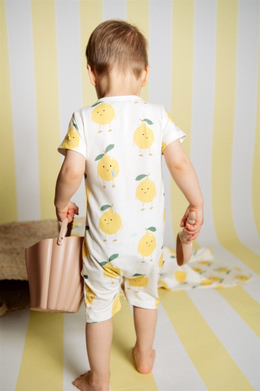 Short romper with lemons print SS23241