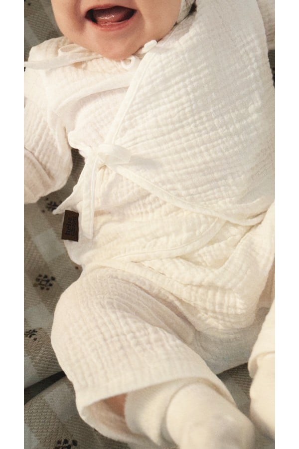 Baby jacket white muslin