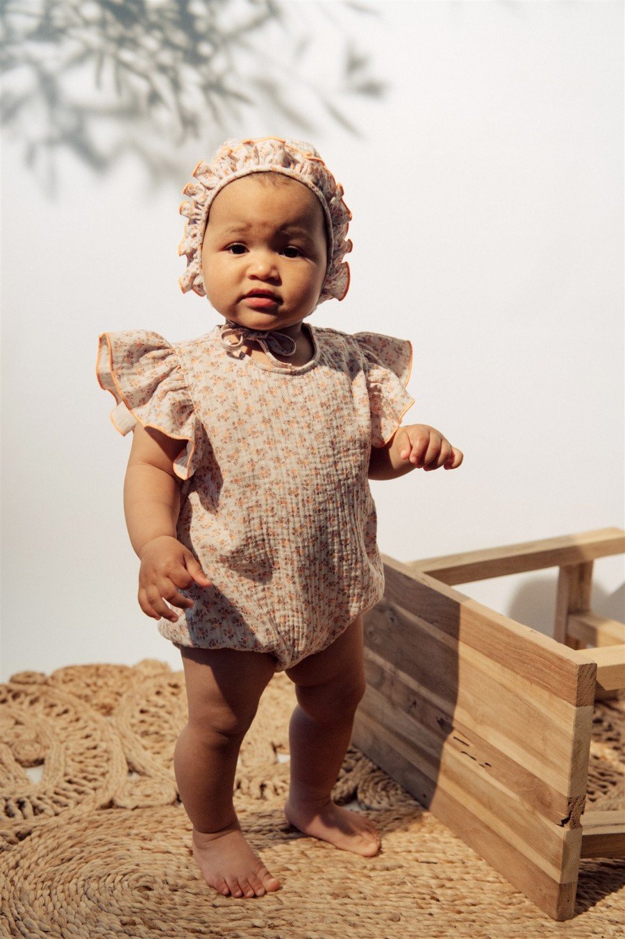 Hat for newborns with orange small floral print SS23081